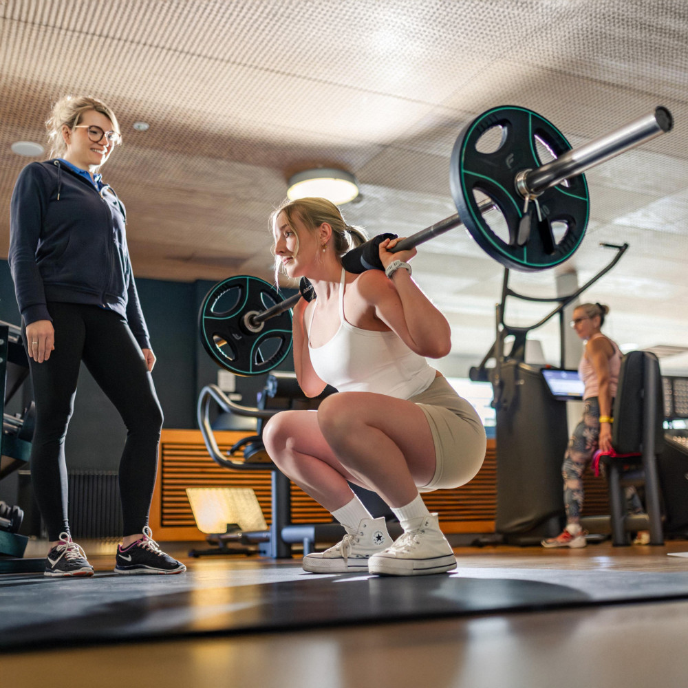 emser therme fitness back squats langhantel